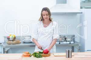Pregnant woman busy in kitchen
