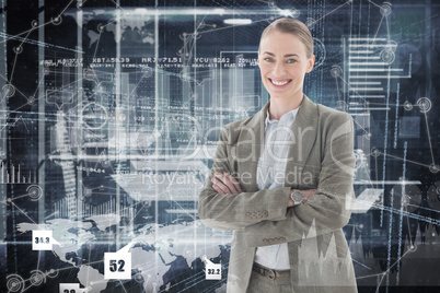 Composite image of portrait of smiling businesswoman standing ar