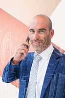 Composite image of smiling businessman calling on the phone