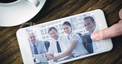 Composite image of smartphone on desk