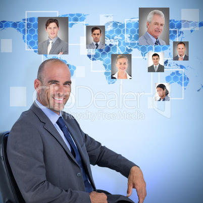 Composite image of portrait of confident businessman sitting on