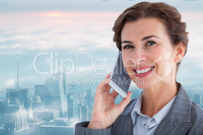 Composite image of portrait of beautiful businesswoman talking o