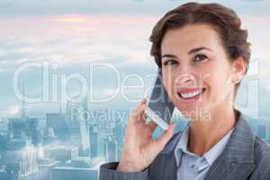 Composite image of portrait of beautiful businesswoman talking o