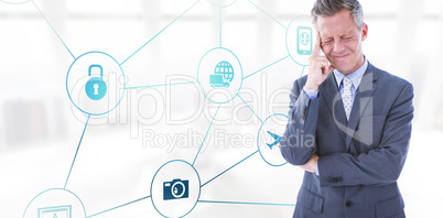 Composite image of businessman with headache