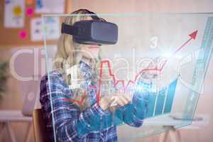 Composite image of pretty casual worker using oculus rift