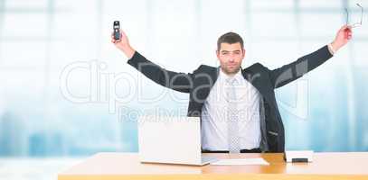 Composite image of businessman holding phone and glasses