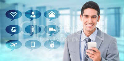 Composite image of businessman using mobile phone with colleague