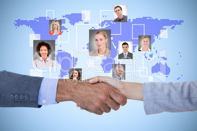 Composite image of business people shaking hands on white backgr