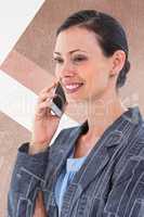 Composite image of businesswoman using her phone