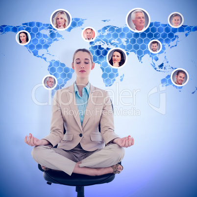 Composite image of peaceful chic businesswoman sitting in lotus