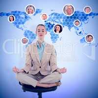 Composite image of peaceful chic businesswoman sitting in lotus