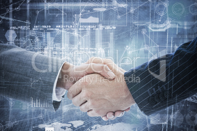 Composite image of business people shaking hands