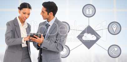 Composite image of business people discussing over digital table