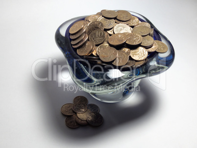 Vase of trifle, beautiful shadow, scattered coins