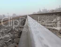Rails, stretching to the horizon, photographed by a camera, plac
