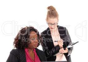 Closeup of two businesswoman working.