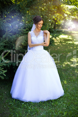 Blonde bride in white dress