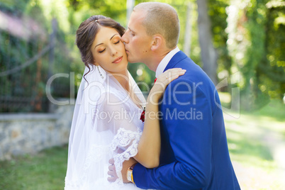 Gentle groom kiss