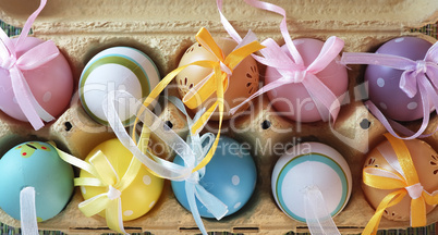 Colorful eggs in a box 2