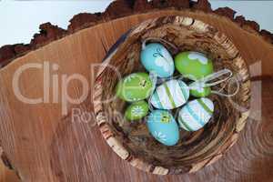 Colorful eggs - wooden background