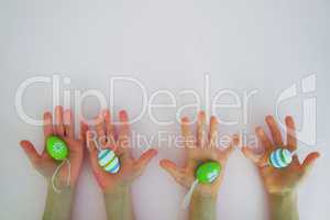 Hands with colorful eggs 3