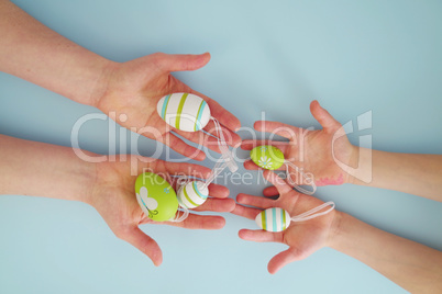 Hands with colorful eggs 5