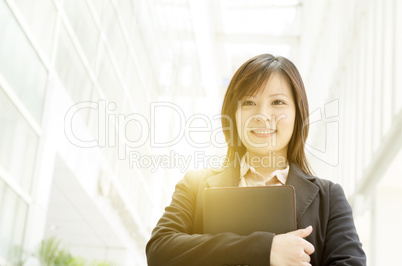 Young Asian business woman with diary