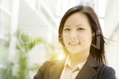 Young Asian business woman smiling