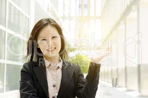 Asian business woman hand holding somethings