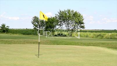 golf yellow flag number four