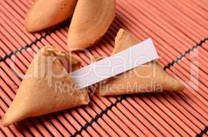 Fortune cookies on bamboo mat
