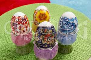Easter eggs in colorful stands