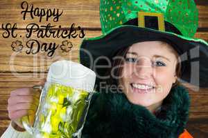 Woman holding beer next to st patricks day greeting