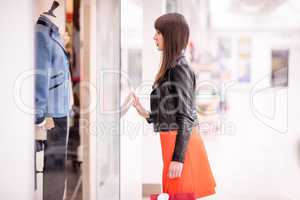 Beautiful woman window shopping