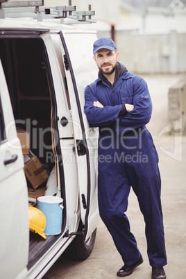 Repairman with arms crossed