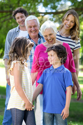 Smiling family standing in a row Smiling family standing in a row