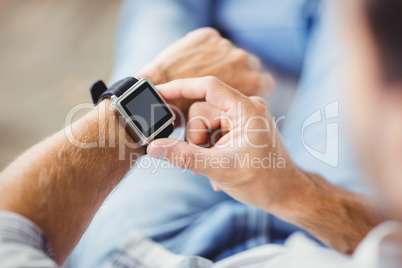 man wearing smart watch