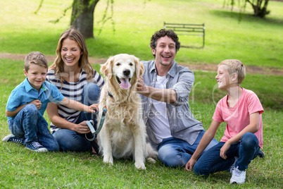 Family with dog in the park