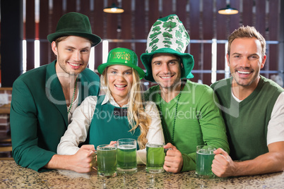 Friends wearing St. Patricks day associated clothes