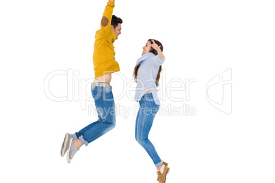 Happy couple jumping together