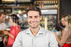 Young man smiling at camera