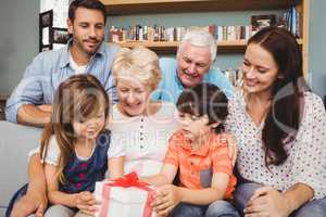 Happy family with gift box