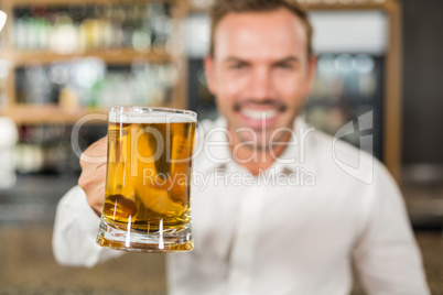 Handsome man toasting