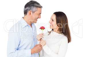 Lovely couple holding flower