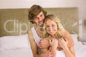 Nice man cuddling his girlfriend
