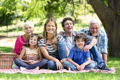 Smiling family having a picnic