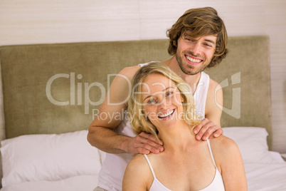 Nice man massaging his girlfriend
