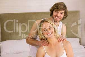 Nice man massaging his girlfriend