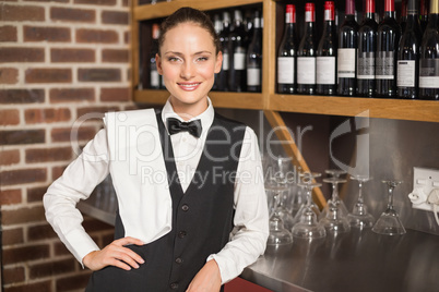 Barmaid smiling at camera