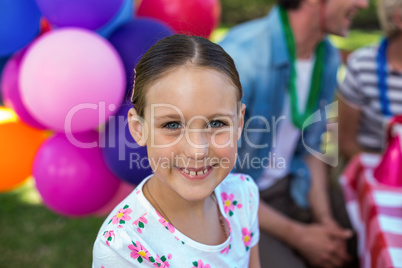 Smiling little girl at birthday party